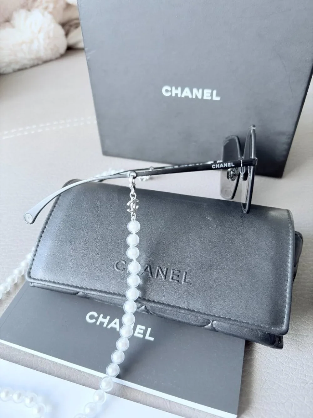 Chanel Butterfly Sunglasses featuring a removable pearl chain